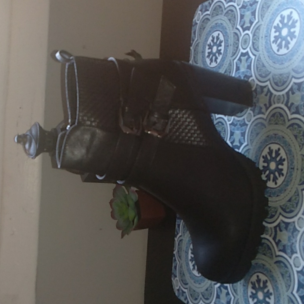 Women's Krush Boots. Brand new with thick heal and treads. Size 7 black leather.